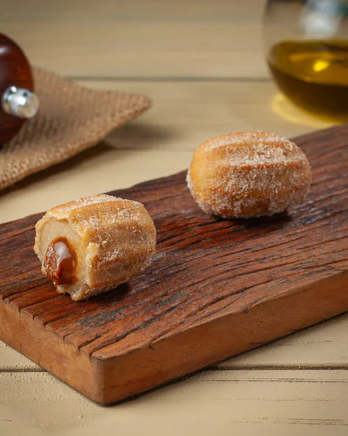 Mini churros doce de leite frito crocante para sobremesa